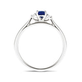 Blue Sapphire 0.60ct Diamond 0.06ct Three Stone Ring 9k White Gold